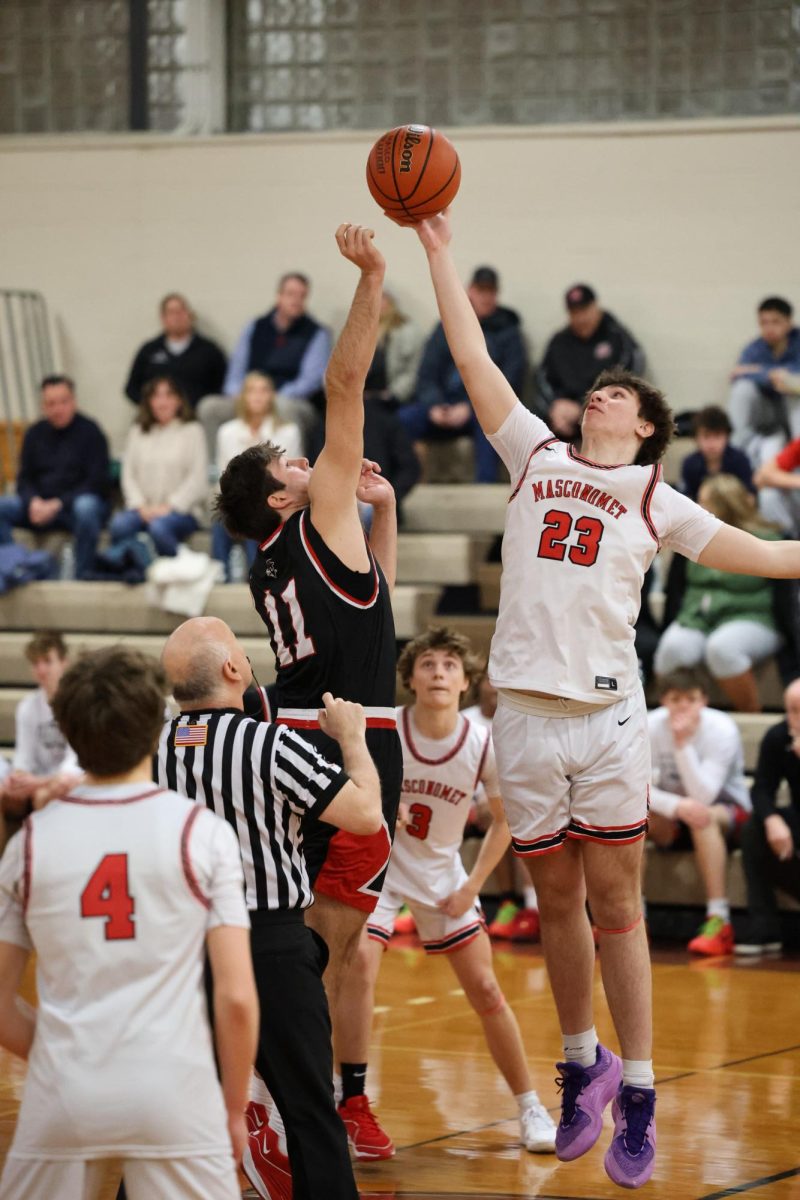 Mascos Jamason Vella (23) and Marbleheads Scott Campbell (11) set for tip-off