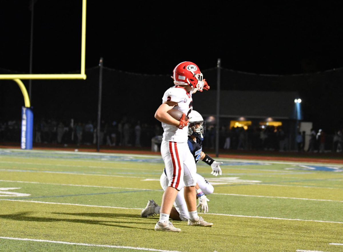 Masco's Liam Ginley celebrating a big catch, getting Masco a first down.