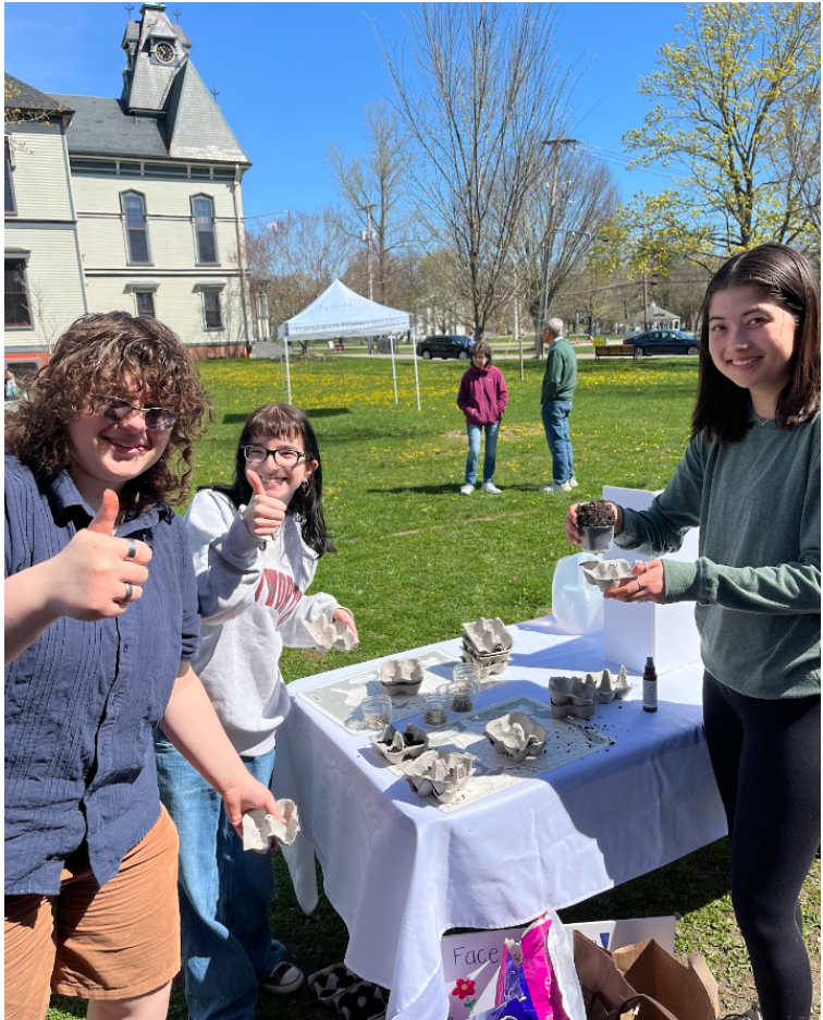 Anjo Kordis, Gabryella Roselli, and Rowan Kinney at this years Earth Day event in Topsfield.