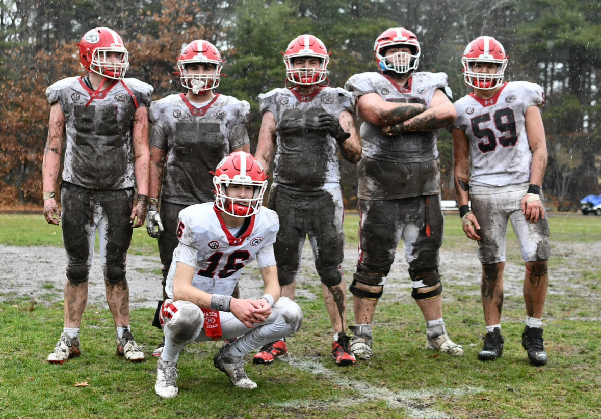 Lineman from left to right, Jackson Magee, Nino Stefanelli, Kaden Mason, Cam Bucchieree, and Evan Verlado with their quarterback Drew Gustafson in front 