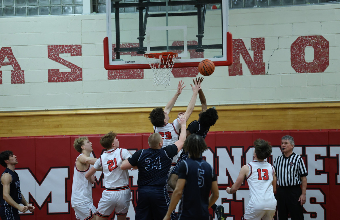 Masco's Jamason Vella with the block