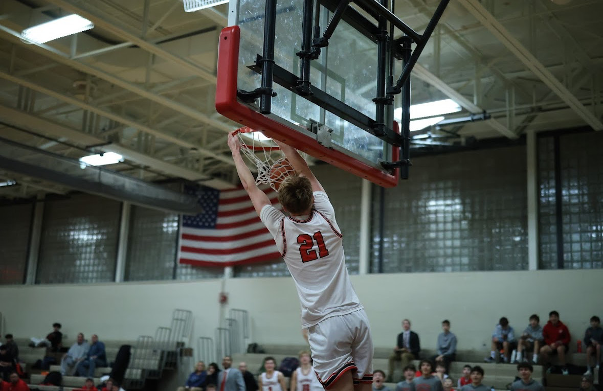 Thomas Denton with the two hand slam 