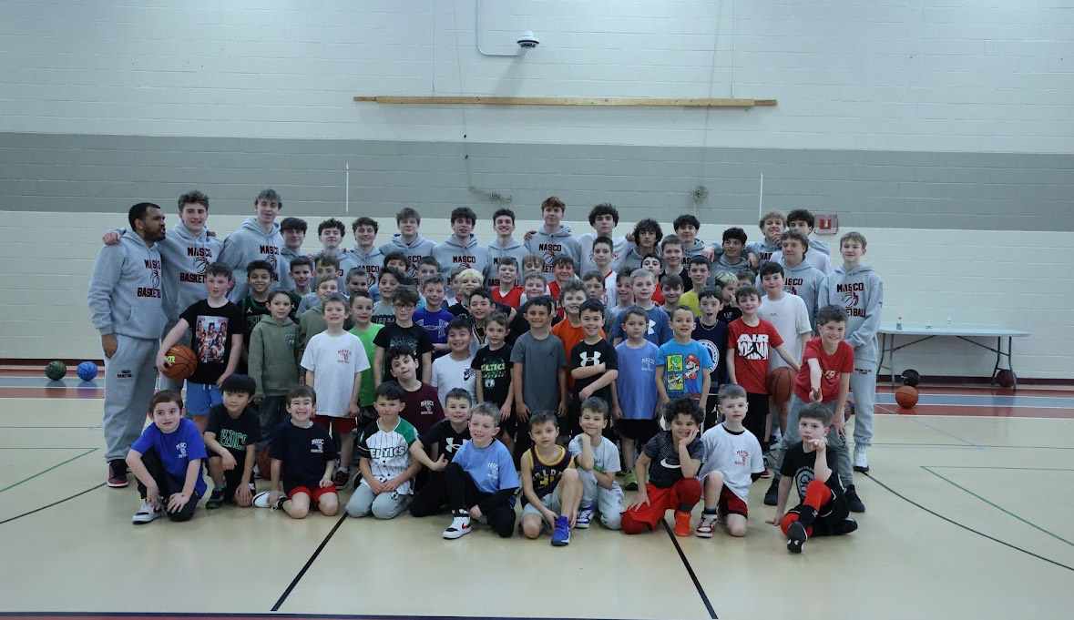  A group picture of the younger kids and coaches  