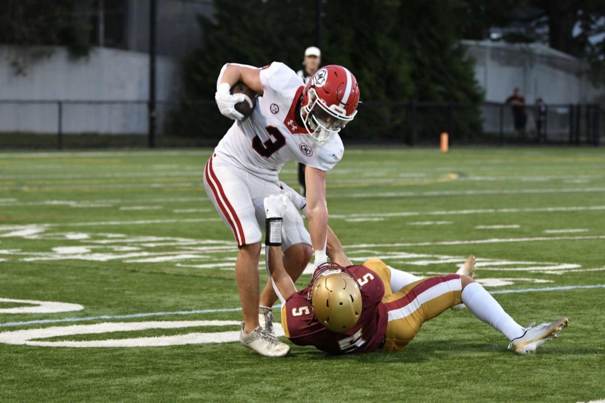 Masco's Ryan Richardson with a vicious stiff arm