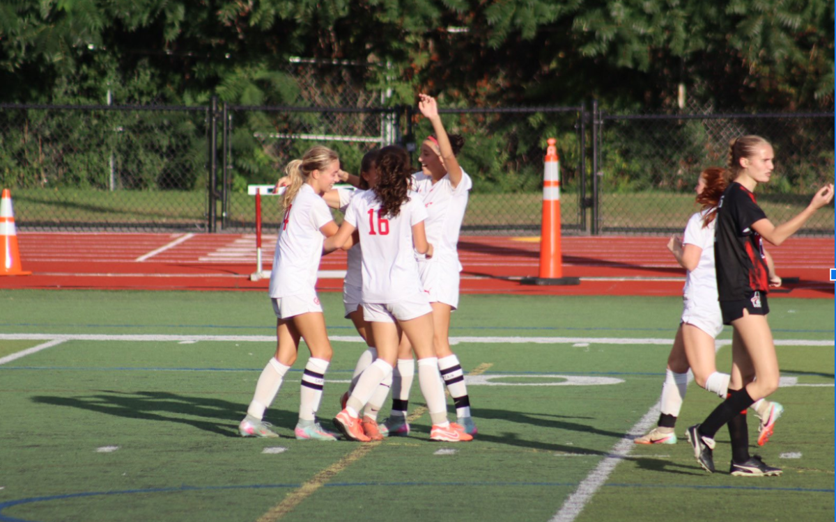 The Chieftains celebrate after junior Victoria Cerbone’s goal.