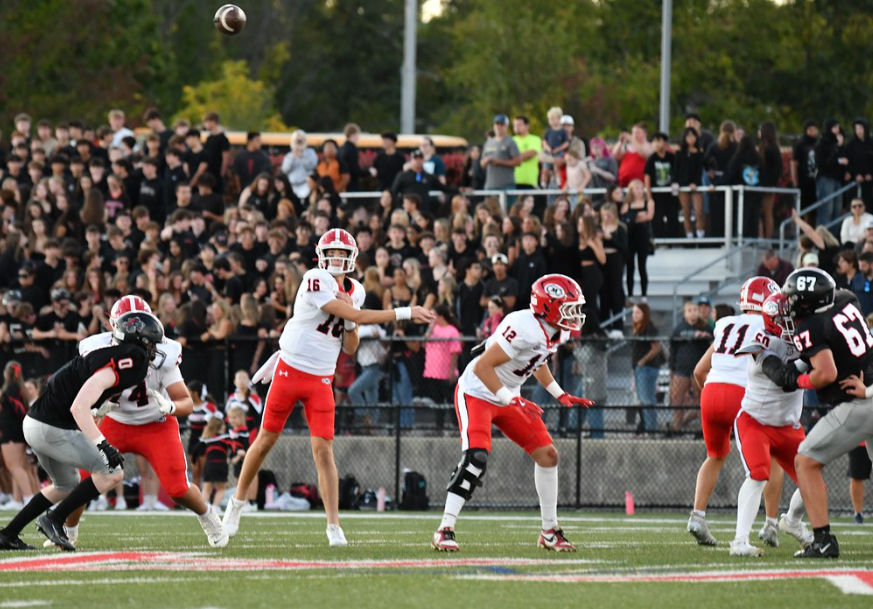 Gustafson, well-protected, throwing a nice ball 