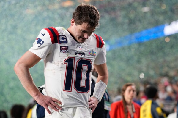 Patriots' Qaurterback Drake Maye walks off after 29-13 Super Bowl Loss